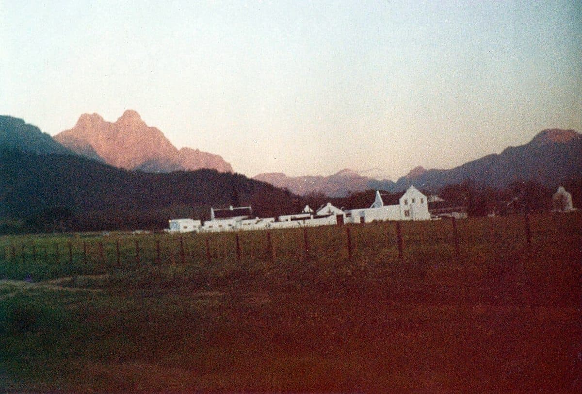 Jonkershoek trail just a step outside Stellenbosch before dusk with a capture of the valley including the far peaks of Drakenstein (centre) and the Twins (left). Stellenbosch is on