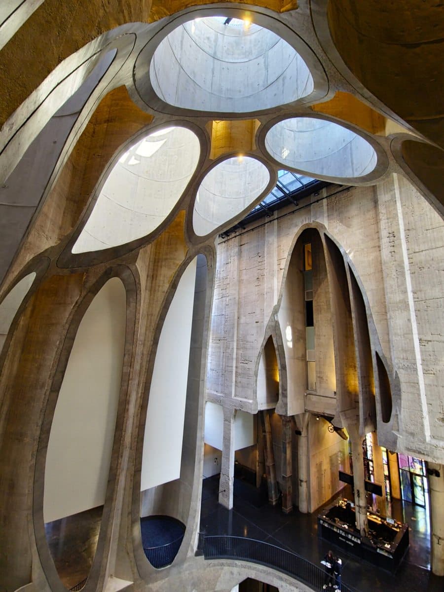 Interior of the Zeitz Museum of Contemporary Art Africa (Zeitz MOCAA), showing the carved concrete atrium created from repurposed grain silos.